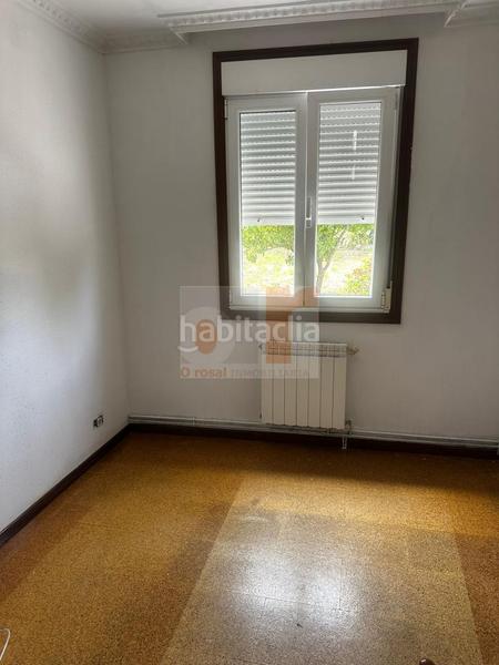 Foto e7b94938-6c5c-4c5c-963a-eeb7b7a8e39f. Haus mit heizung parking in Moaña