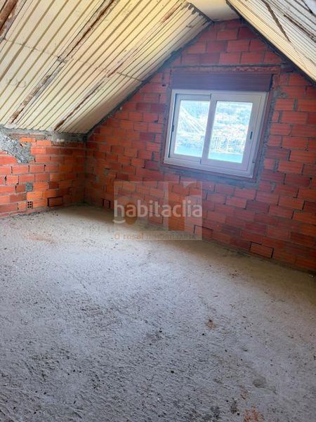 Foto d4f61e6b-b50c-4f98-ab2e-de2f4ea1fb73. Casa amb calefacció aparcament a Moaña