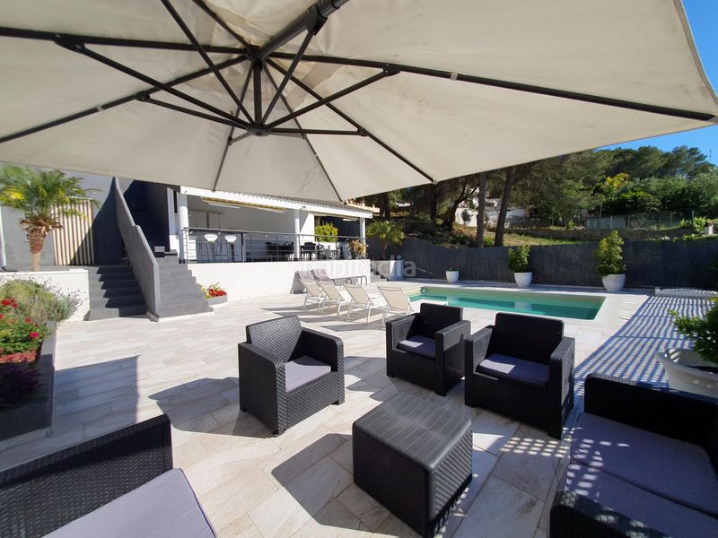 Foto 57e13223-f0a4-4314-9555-3367d71eecbe. Casa amb xemeneia calefacció aparcament piscina a Canyelles