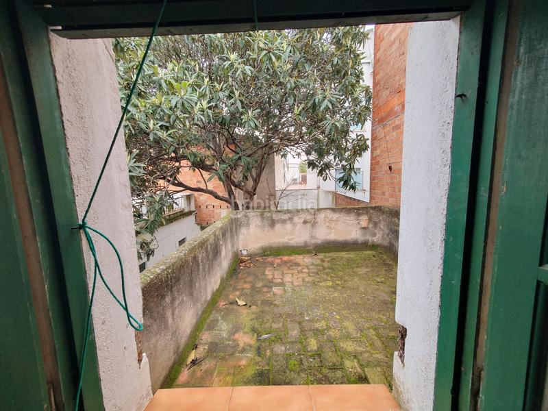 Foto cbab63ad-90ea-4292-89e4-e75f6996c635. Casa aparellada a Nucli Antic Cunit