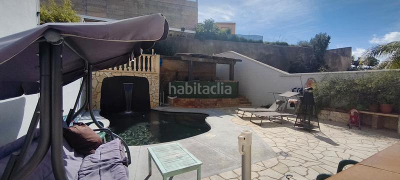 Foto c7f6afc2-348a-4adb-b80f-17cc83802475. Casa adosada chalet adosado en zona muy tranquila en Málaga