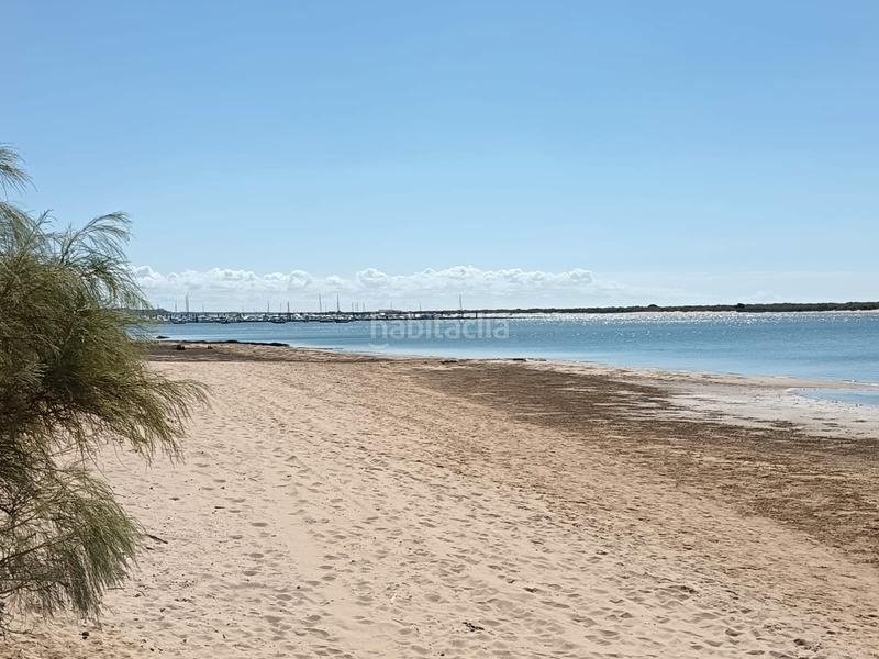 Foto 0413425b-a9ed-418f-937f-858602deabe2. Casa adosada espectacular casa pareada con piscina comunitaria a la venta – cartaya (urb. los enebros) lista para entrar a vivir en El Rompido