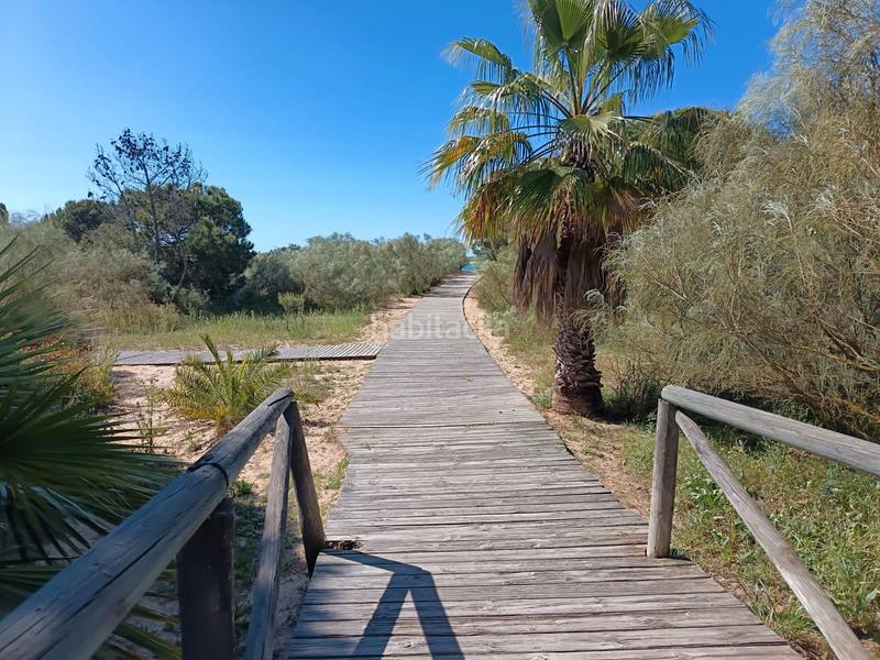 Foto 532e5c97-3005-479f-a880-75dcc2048ad6. Casa adosada espectacular casa pareada con piscina comunitaria a la venta – cartaya (urb. los enebros) lista para entrar a vivir en El Rompido