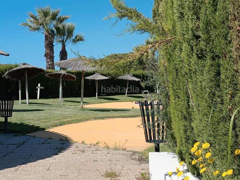 Foto 713cbc12-8dab-4ffe-aca2-daf8e20f3ef0. Casa adosada espectacular casa pareada con piscina comunitaria a la venta – cartaya (urb. los enebros) lista para entrar a vivir en El Rompido