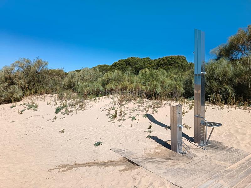 Foto 8a058fc8-5e2e-4176-9934-e4ee3b6ac1f5. Casa adosada espectacular casa pareada con piscina comunitaria a la venta – cartaya (urb. los enebros) lista para entrar a vivir en El Rompido