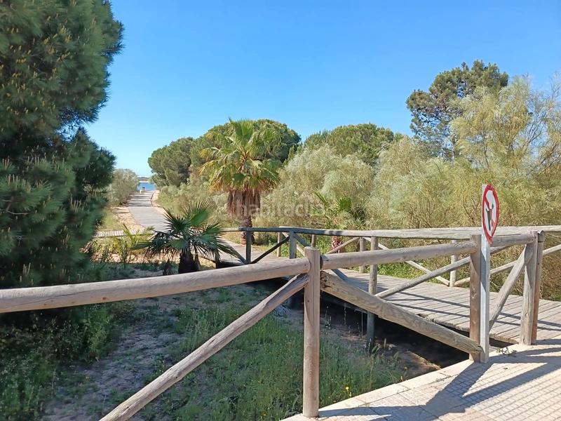 Foto ffac2ac0-c3c0-4be3-93c7-ba259e4554ff. Casa adosada espectacular casa pareada con piscina comunitaria a la venta – cartaya (urb. los enebros) lista para entrar a vivir en El Rompido