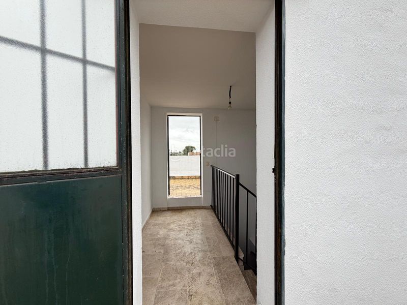 Foto be93bb90-7709-4838-a5a9-5298ac9c5541. Casa a schiera con parcheggio in Bollullos de la Mitación