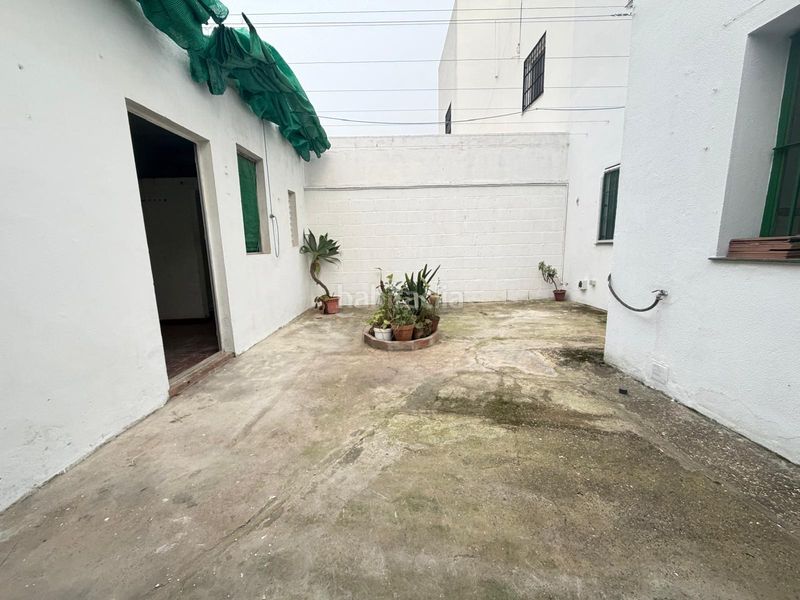 Foto ed90337c-f87e-4e11-b840-8ca660990745. Casa a schiera con parcheggio in Bollullos de la Mitación