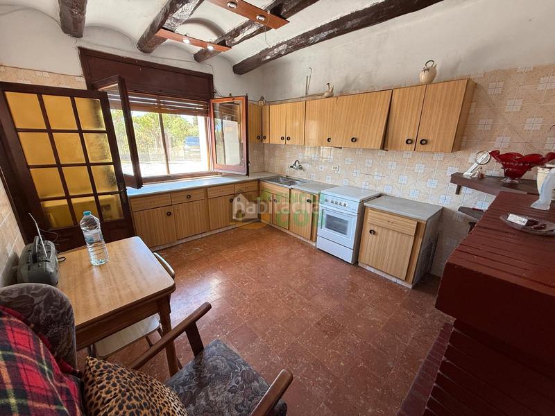 Foto b38e2c6a-8d08-4fcd-8c03-54d90a82b4a7. Maison avec cheminée parking dans Font-rubí