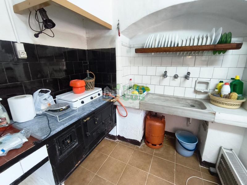 Foto f057b90c-f201-405d-8117-a7f75bce0323. Casa amb xemeneia aparcament a Rellinars