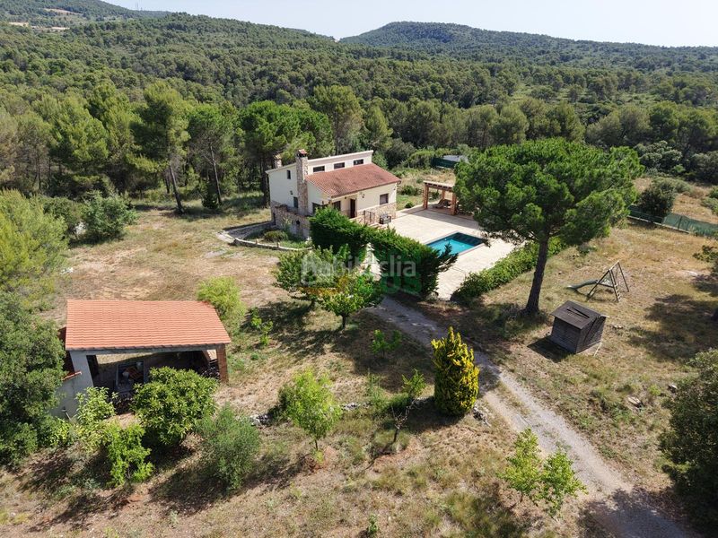 Foto 77e51de4-b224-45bc-81fd-b218f39c5ba1. Casa amb xemeneia aparcament piscina a Pontons