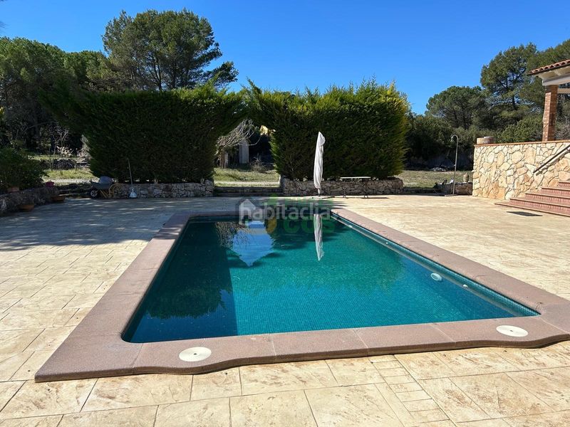 Foto a9f88d90-f7f0-46ec-9de4-59571b53802f. Casa amb xemeneia aparcament piscina a Pontons