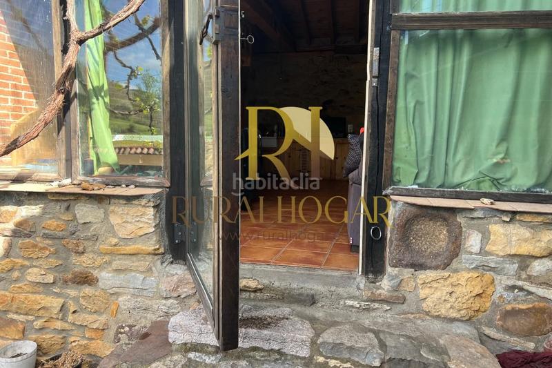 Foto 2fc157be-4c4b-4cf3-90a1-4044e43fed8b. Casa en carretera general-co 7 ¡descubre la casa perfecta rodeada de hermosos paisajes en la zona ! amplio terreno de 1650m2 dividido en tres parcelas y en Boñar