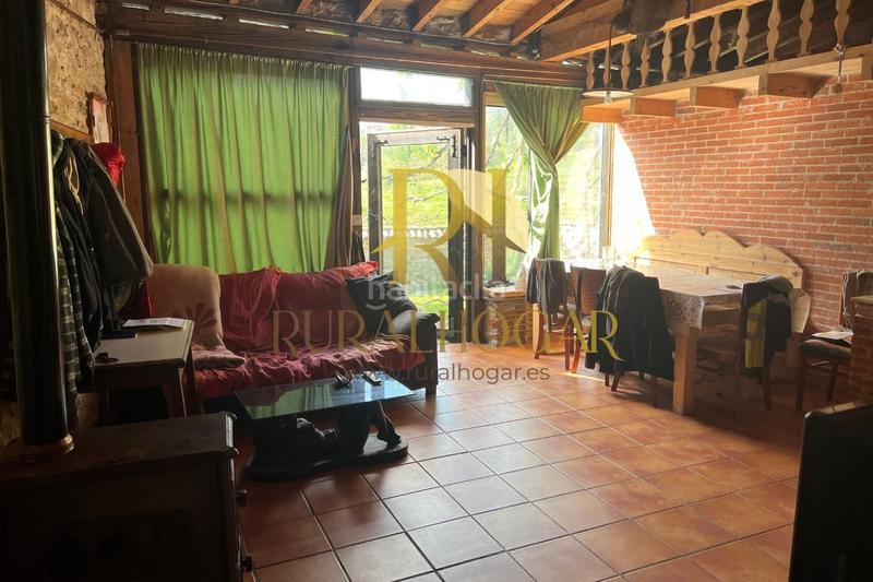 Foto cbcdb01e-9a35-4f47-bf6c-cbc16b993d5a. Casa en carretera general-co 7 ¡descubre la casa perfecta rodeada de hermosos paisajes en la zona ! amplio terreno de 1650m2 dividido en tres parcelas y en Boñar