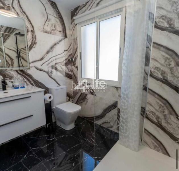 Foto 7a5a33e3-9495-4515-a5fd-9b32edc9278c. Casa con parcheggio piscina in Playa Fañabé Alto Adeje