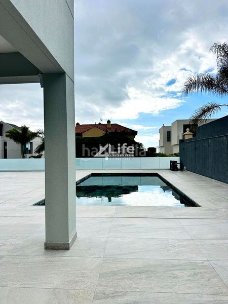 Foto 61114c60-264b-4ef8-9877-493c6da2d22c. Casa amb aparcament piscina a Playa Fañabé Alto Adeje