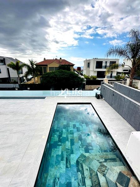 Foto c95e067c-3766-4364-ad94-b6e78b11a5eb. Casa amb aparcament piscina a Playa Fañabé Alto Adeje