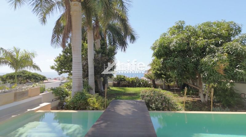 Foto e481abfb-8066-45c5-b990-ac59edb84abf. Casa amb aparcament piscina a Playa Fañabé Alto Adeje