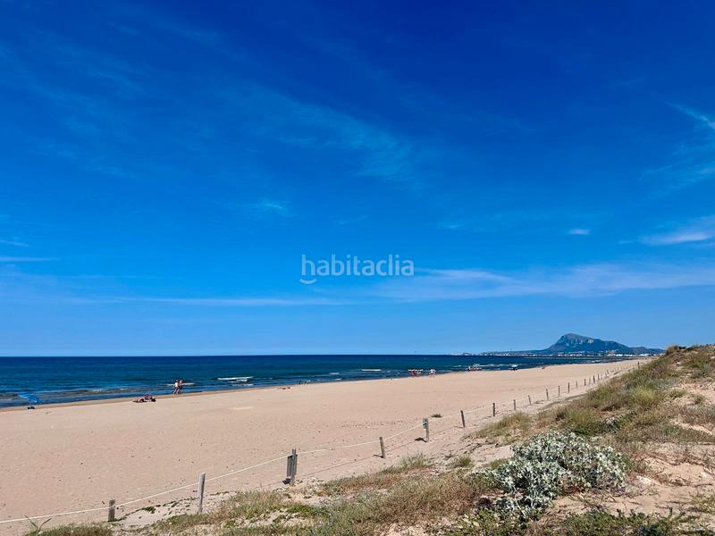 Foto dbfa2e1e-3695-4065-bfd7-12f24e40e300. Piso comodidad junto al mar — con solárium, cenador y piscina en Oliva