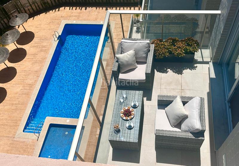 Foto e945f534-3af7-47ce-be1e-6db0973ec5ca. Piso comodidad junto al mar — con solárium, cenador y piscina en Oliva