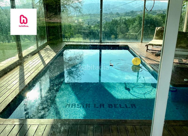 Foto 1d0ed1ef-7c10-401c-99df-293120f2d63e. Casa amb xemeneia aparcament piscina a Can Violí - Can Poi del Bosc Garriga (La)