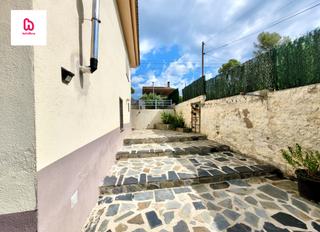 Xalet a Bigues i Riells. Casa de  2 plantas en 5 habitaciones jardín piscina y garaje