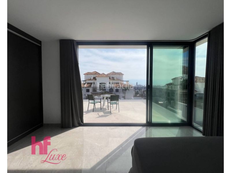 Foto 32e98adb-6ddf-4ad4-936c-9a833dfd34cc. Xalet amb calefacció aparcament piscina a Golf Bahía Finestrat