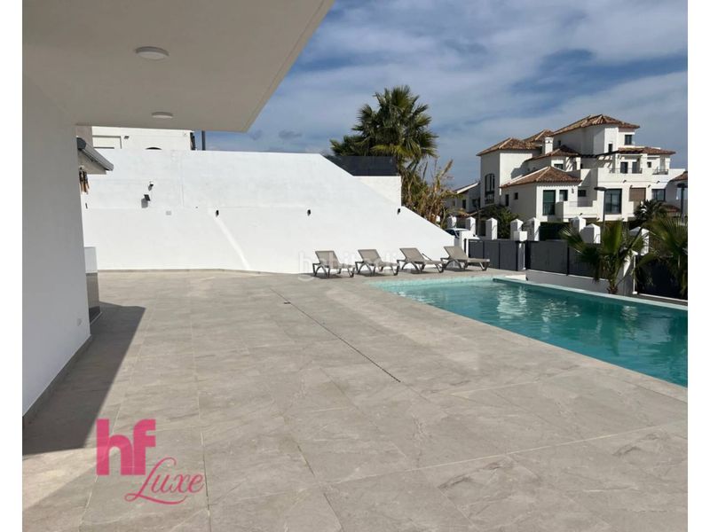 Foto 50ef5c64-bf73-47a4-92f5-a423a2b8cdba. Xalet amb calefacció aparcament piscina a Golf Bahía Finestrat