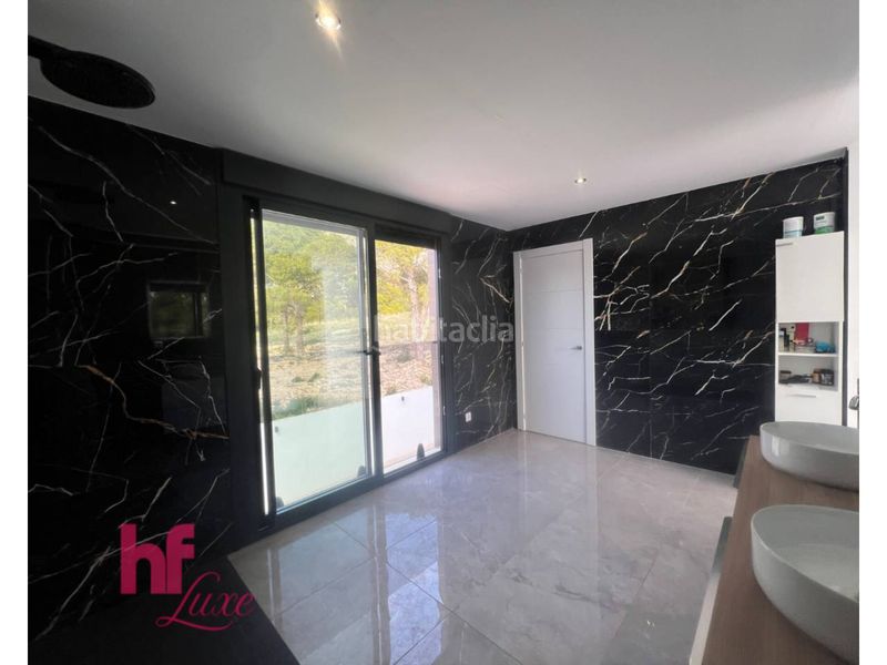 Foto f00b0530-ba0b-49b7-b127-df19219e4e0c. Xalet amb calefacció aparcament piscina a Golf Bahía Finestrat