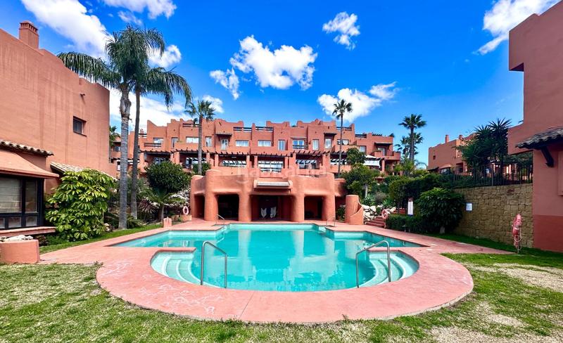 Foto 00fc80ee-b33e-4bf7-905e-cefd577a5a82. Casa a schiera con parcheggio piscina in Chullera Manilva