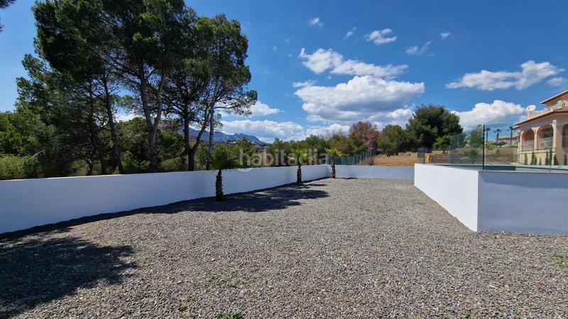 Foto 4f8eb1d6-c54e-4524-b8f9-e02e9dc191b6. Chalet mit heizung parking pool in El Tossal-Bello Horizonte Nucia (la)