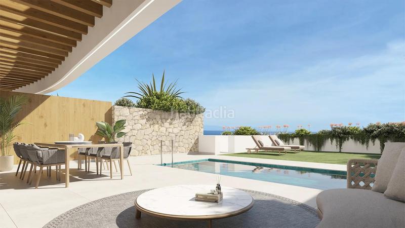 Foto 9efad41c-64c1-402e-a5de-ed2d49d5fd46. Chalet with parking pool in El Faro de Calaburra - Chaparral Mijas