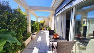 Attique à Calle assagador de la marjal. Ático luminoso con gran terraza a 4 min a pie de la playa de les