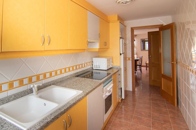 Foto 8f090945-aeab-4042-bac2-1e062459751e. Apartament amb aparcament piscina a Playa de Gandía Gandia