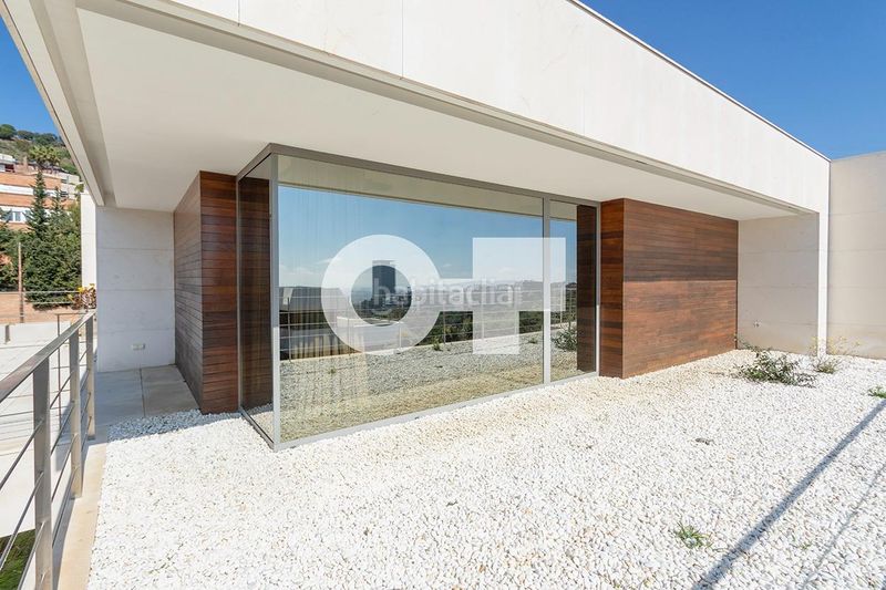 Foto c29b4958-36a9-46a6-a9a2-8fb75b322df8. Casa adossada amb calefacció aparcament piscina a Esplugues de Llobregat