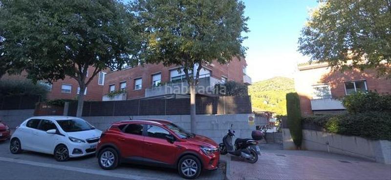 Foto ba19d11d-80b1-451f-a086-9049b3dcfb93. Autoparkplatz in Teià