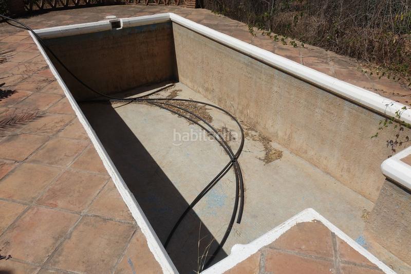 Foto 7dcf13d1-1100-4e24-8f7f-d6320f14abb8. Chalet mit parking in Órgiva