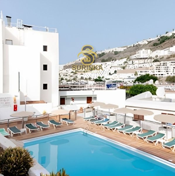 Foto 22f4aa58-43c6-42fa-ad5f-f71d3bbcc961. Duplex avec piscine dans Puerto Rico Mogán