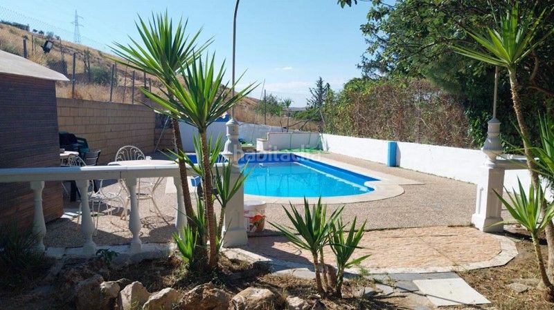 Foto 83e106af-5e37-4556-b60e-846a9e69ae5c. Masia amb xemeneia piscina a Padul