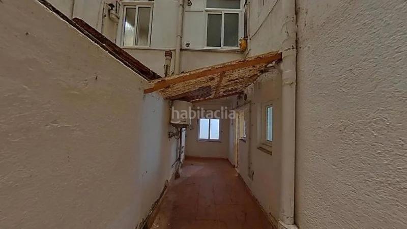 Foto a7b64052-9c6e-4ca7-a4d6-5f52d9e70acf. Piso (barcelona). "okupado" (no se puede visitar ni hipotecar). en Ripollet