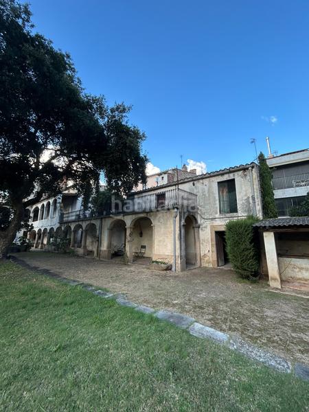 Foto 590794ee-1bbd-4d07-a0fe-a9d197415dc4. Casa adosada edificio , para reformar, con vistas y jardín privado en Santa Coloma de Farners