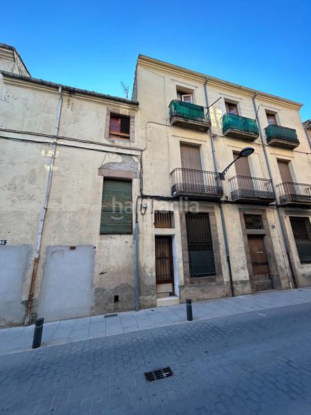 Foto 76acf87f-ed2f-4885-a5a8-ee4edbd49a60. Casa adosada edificio , para reformar, con vistas y jardín privado en Santa Coloma de Farners