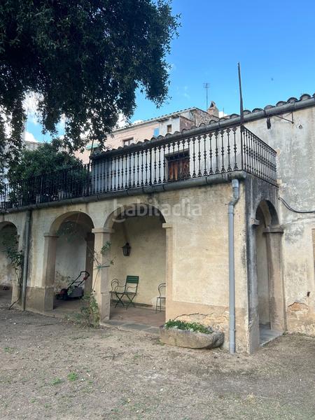 Foto c5f4bc2b-0519-4f85-97f0-da712f1d7977. Casa adosada edificio , para reformar, con vistas y jardín privado en Santa Coloma de Farners