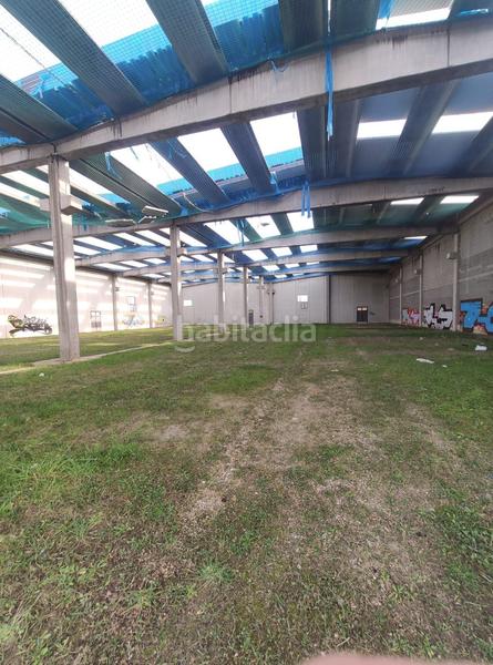 Foto 0add82ee-f226-4157-b961-a6f9834df5c3. Nave industrial  en venta en el polígono en Santa Coloma de Farners