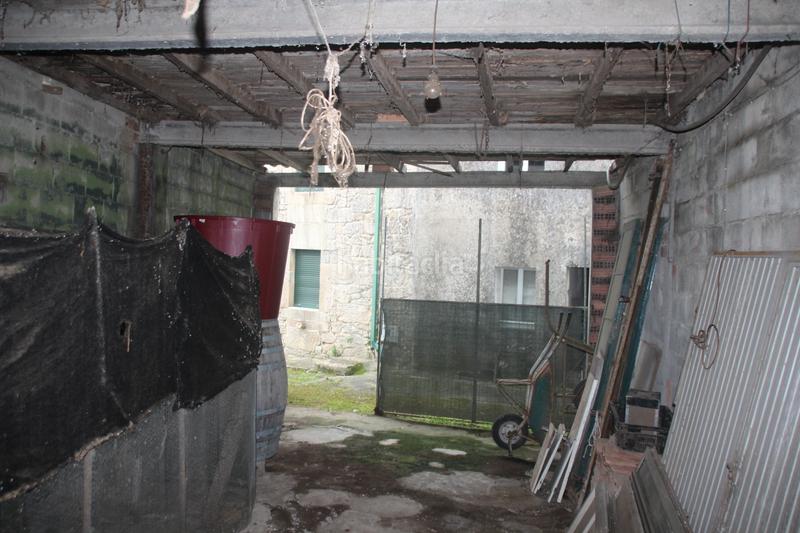 Foto cfeca168-26e3-4310-ba67-1a496fa9831a. Casa adossada a aldea lestrove 62 a Dodro