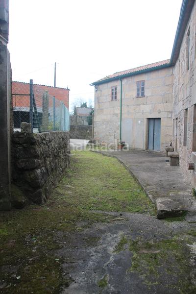 Foto e0ab2cc7-bd40-4e19-a415-ee5e8ca90460. Casa adossada a aldea lestrove 62 a Dodro