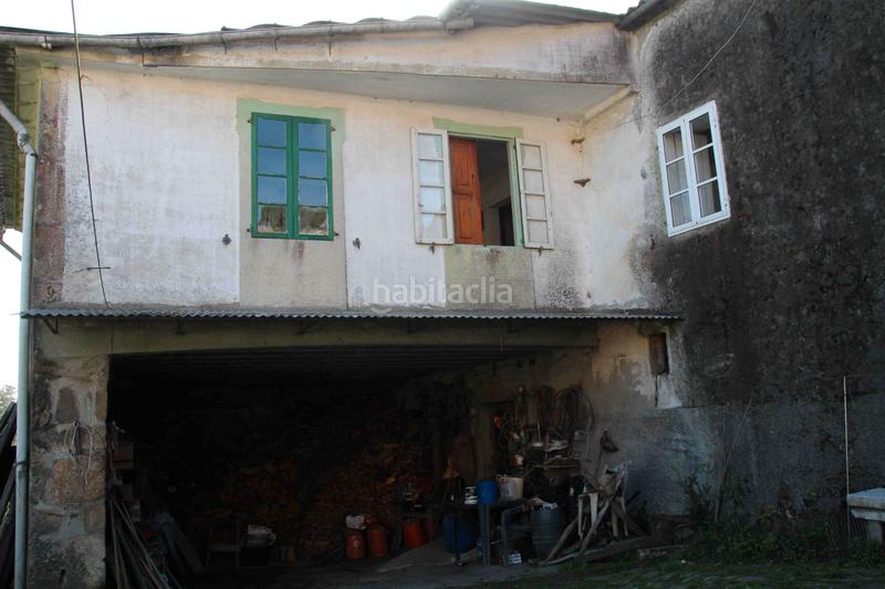 Foto b5f78f26-a0a8-4566-a789-5e7c8c439272. Maison avec cheminée chauffage dans Dodro