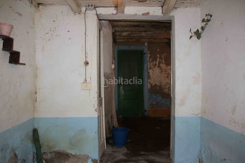 Foto 60d3e0de-a786-4045-85e4-079972c82e03. Casa adossada a Dodro