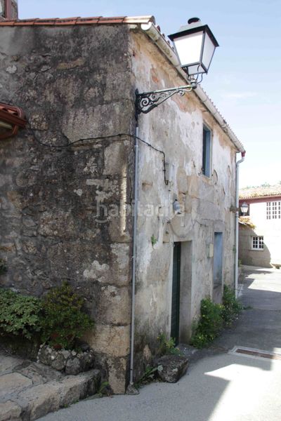 Foto 971c7741-2834-4e88-8ba6-6ec3b7f5b3aa. Casa adossada a Dodro