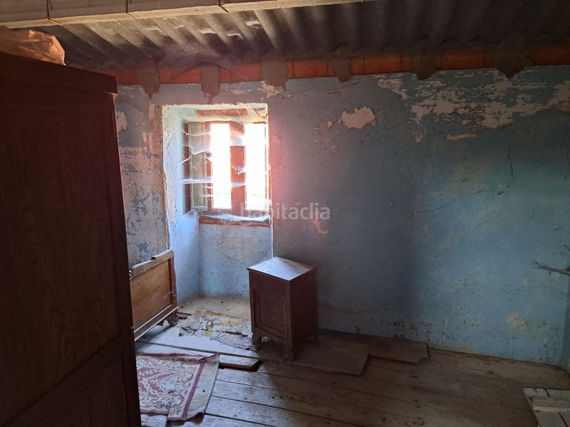 Foto af5fecd3-ac36-40b0-9796-cc726c62a730. Casa adossada a Dodro